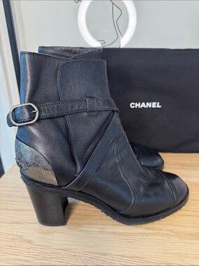 CHANEL Black Leather Ankle Boots with Buckle Strap